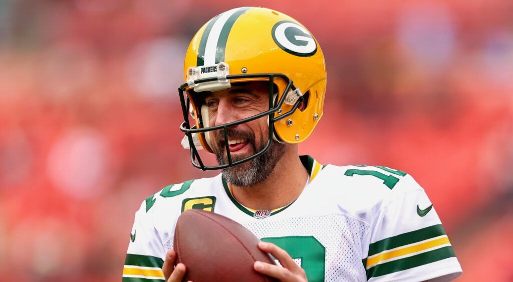 Green Bay Packers quarterback Aaron Rodgers smiling during warmups.