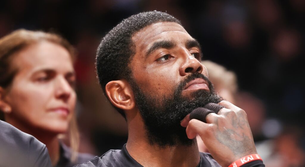 Kyrie Irving scratching his beard