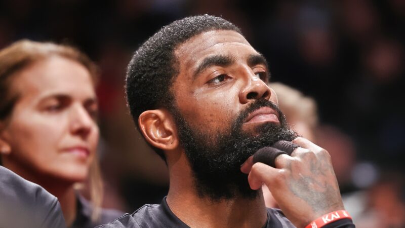Kyrie Irving scratching his beard