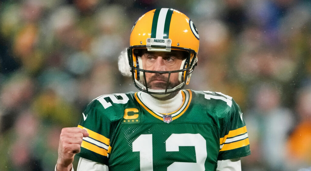Green Bay Packers quarterback Aaron Rodgers does a fist pump after a touchdown.