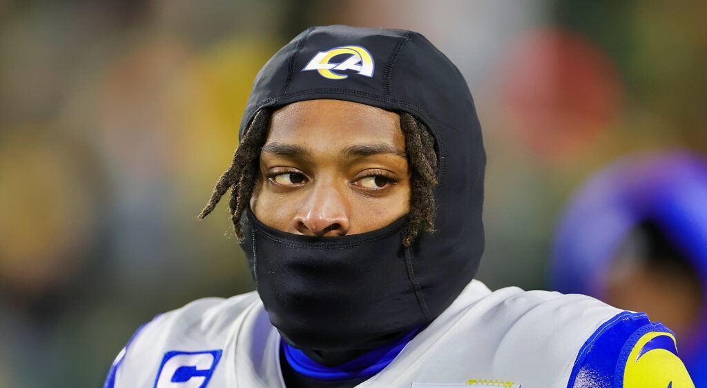 Jalen Ramsey with a ski mask on face and in uniform