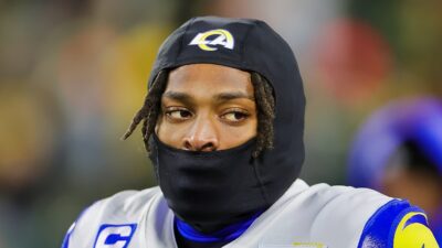 Jalen Ramsey with a ski mask on face and in uniform