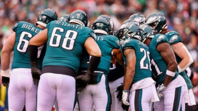 Eagles players in huddle