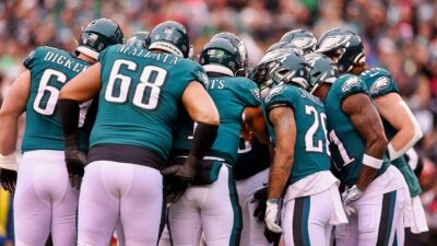 Eagles players in a huddle
