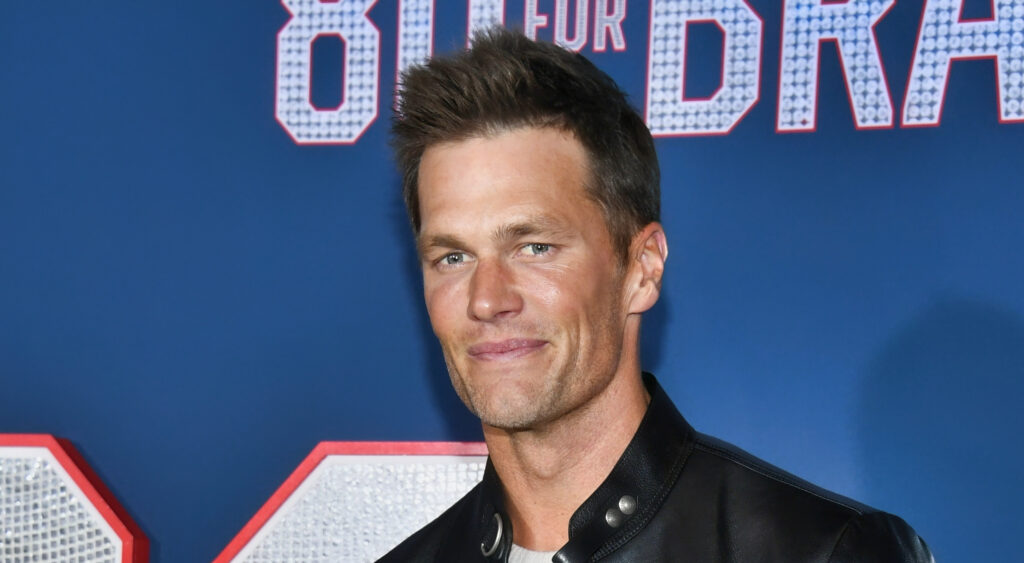 Tom Brady poses for photo at premiere in Los Angeles