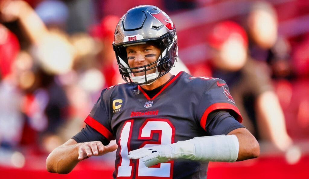 Tampa Bay Buccaneers quarterback Tom Brady smiling ahead of a game vs. Cincinnati Bengals.