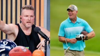 brett favre on golf course. Pat Mcafee pointing