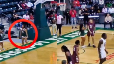 cheerleader confronting player on court