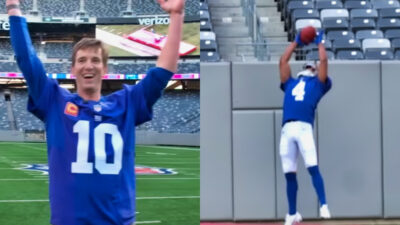 eli manning with his hands up while Michael B Jordan is catching football in Giants uniform