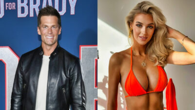 Tom Brady in black while Veronika Rajek poses in orange bikini