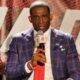 Deion sanders with ESPN mic in hand