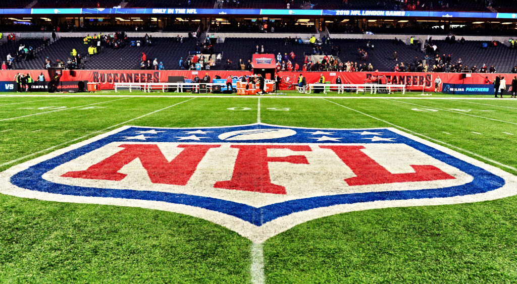 NFL logo mid field.