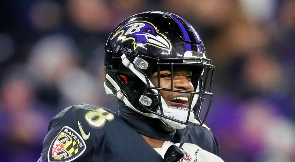 Baltimore Ravens quarterback Lamar Jackson smiling during 2019 game.