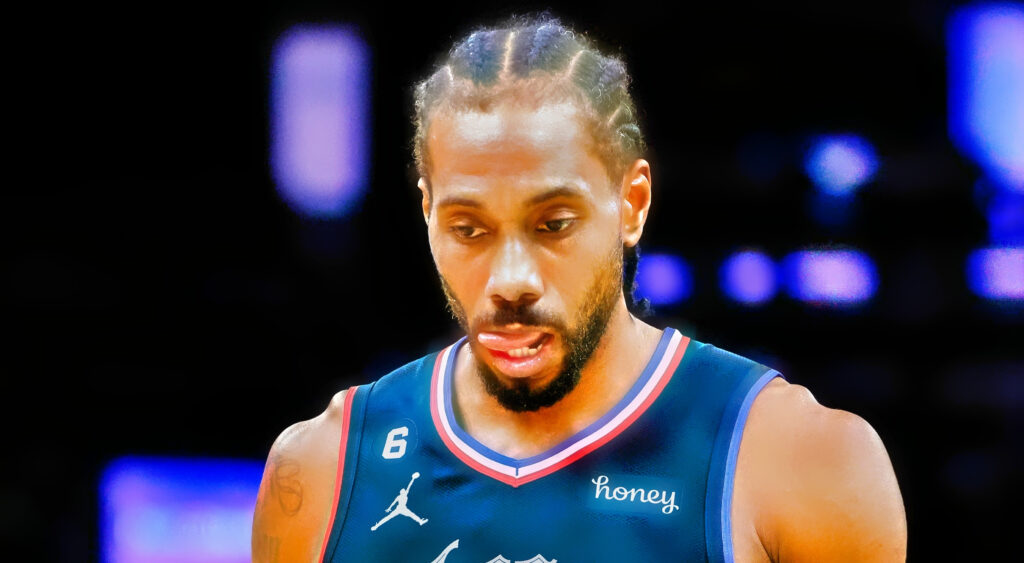 Los Angeles Clippers' star Kawhi Leonard looking down during game.