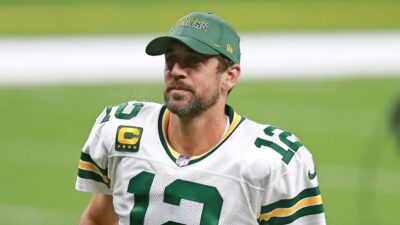Aaron Rodgers wearing a hat