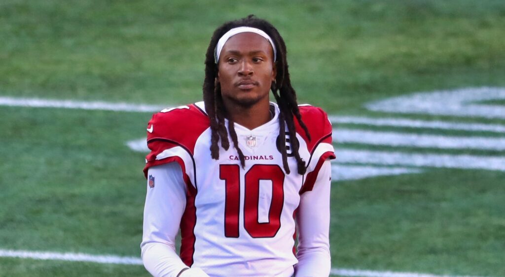 DeAndre Hopkins in uniform with no helmet on