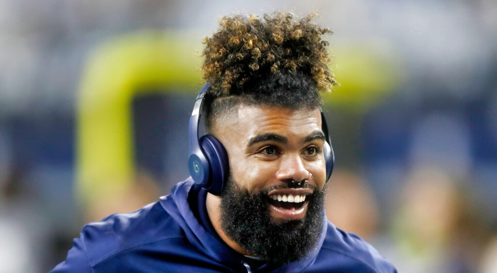 Dallas Cowboys running back smiling during warm-ups for 2021 game.