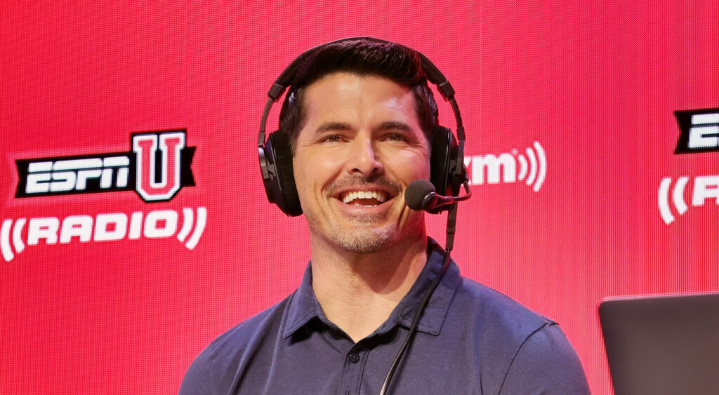 David Carr smiling with headset on