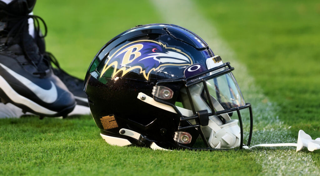Ravens helmet on ground