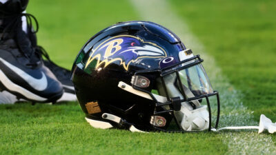 Ravens helmet on ground