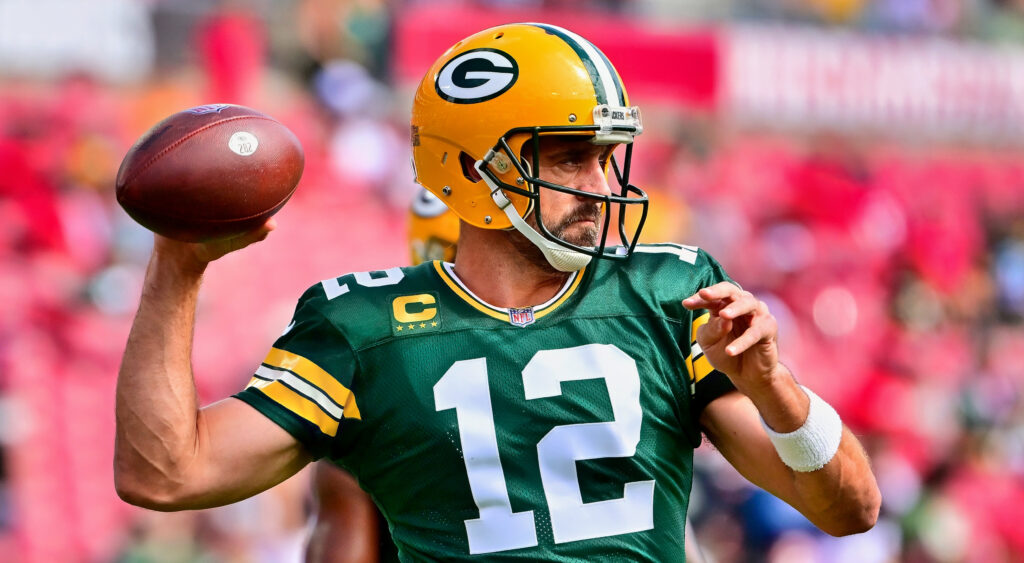 Green Bay Packers quarterback Aaron Rodgers throwing football during warmups.