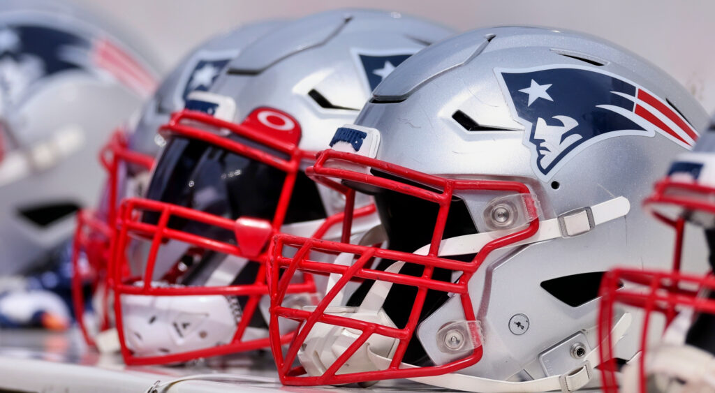 New England Patriots helmets on the bench at Gillette Stadium.