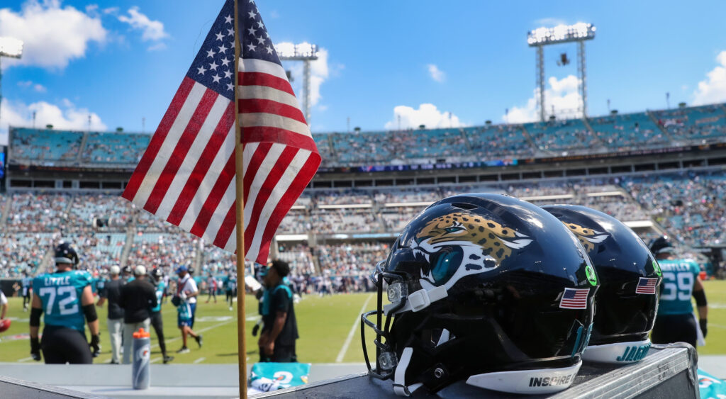 Jaguars helmets next to small American Flag