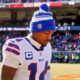 Stefon Diggs with his head down in Bills gear