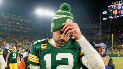Aaron Rodgers walking off field after a game