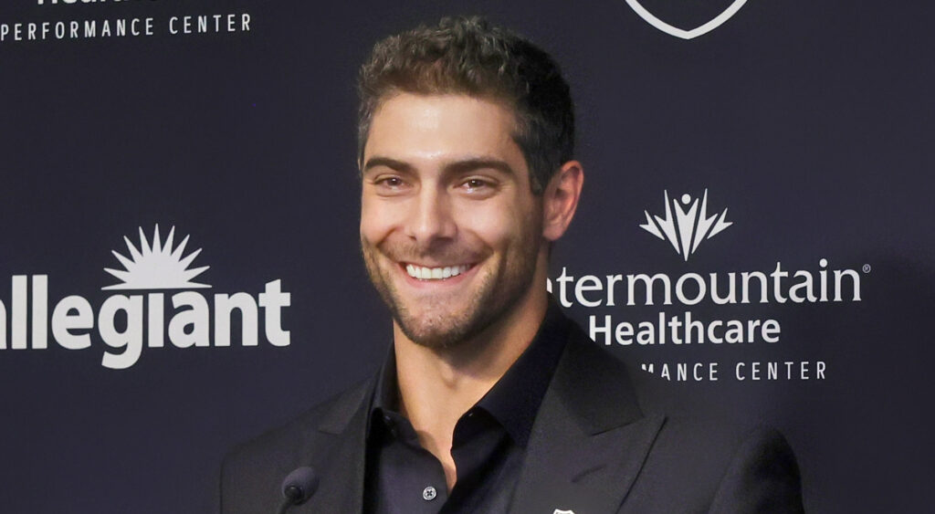 Jimmy Garoppolo smiling during introductory Raiders press conference