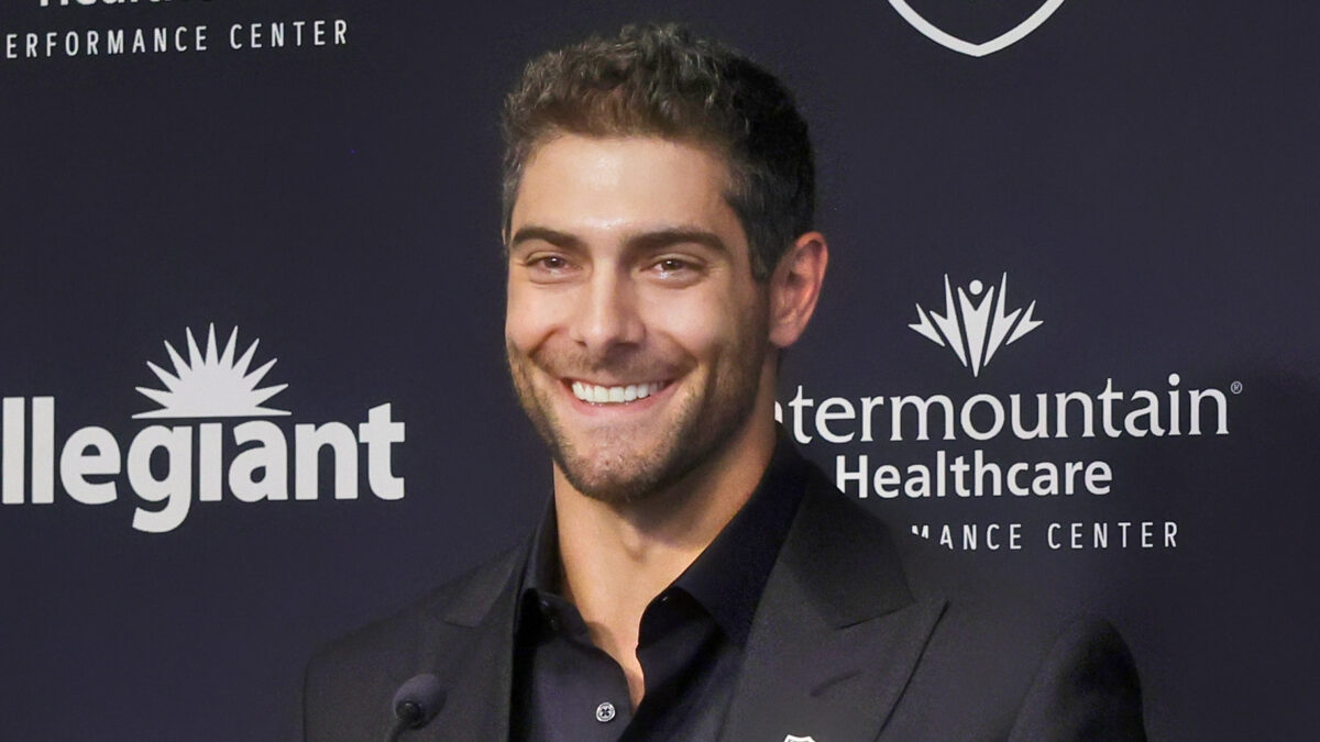 Jimmy Garoppolo smiling during introductory Raiders press conference