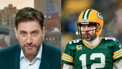 mike greenberg on espn while picture shows Aaron rodgers in uniform
