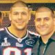 Aaron Hernandez and brother DJ hugging and posing for picture
