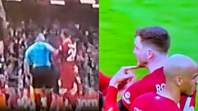 Andy Robertson being elbowed by ref and him complaining while pointing to chin