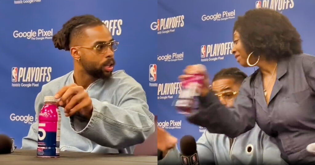 D’Angelo Russell drink on table and woman taking it