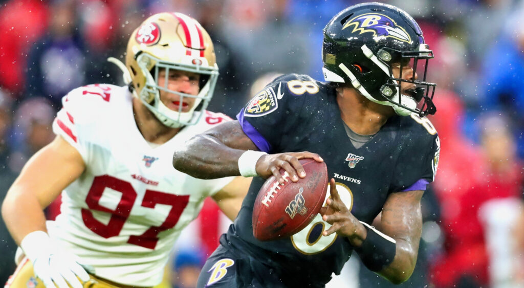 Baltimore Ravens' quarterback Lamar Jackson scrambling away from Nick Bosa of San Francisco 49ers.