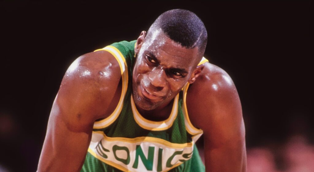 Shawn Kemp puts his hands on his knees during a game.