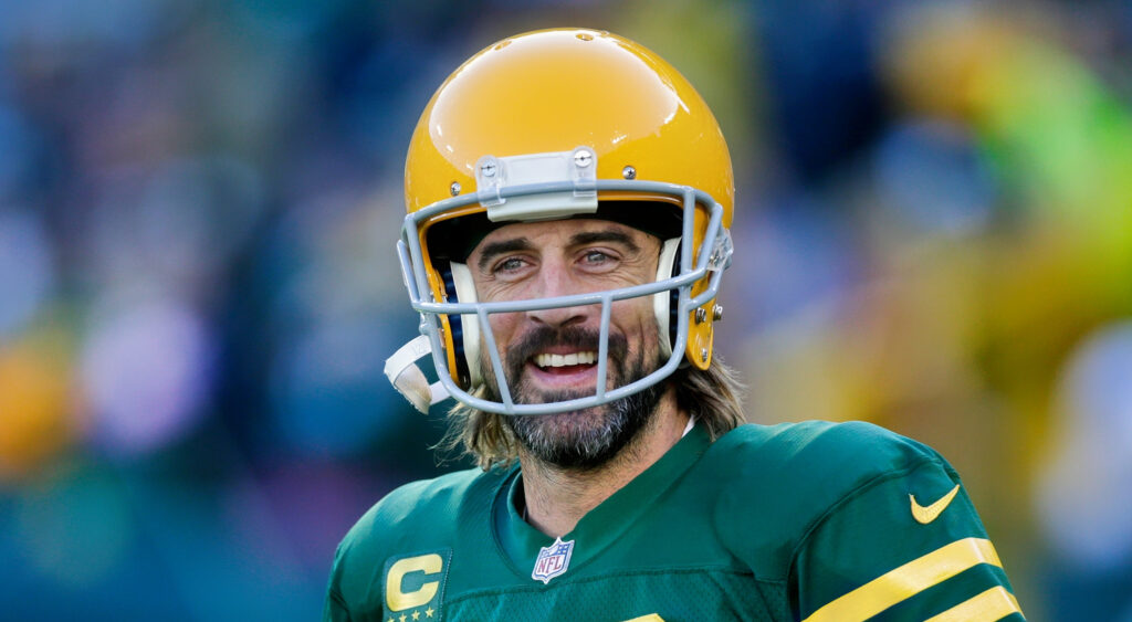 Aaron Rodgers in uniform and smiling