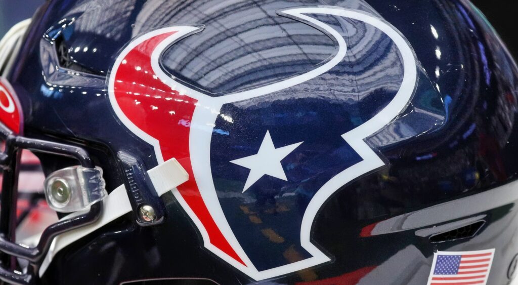 A closeup of the logo on a Houston Texans helmet.