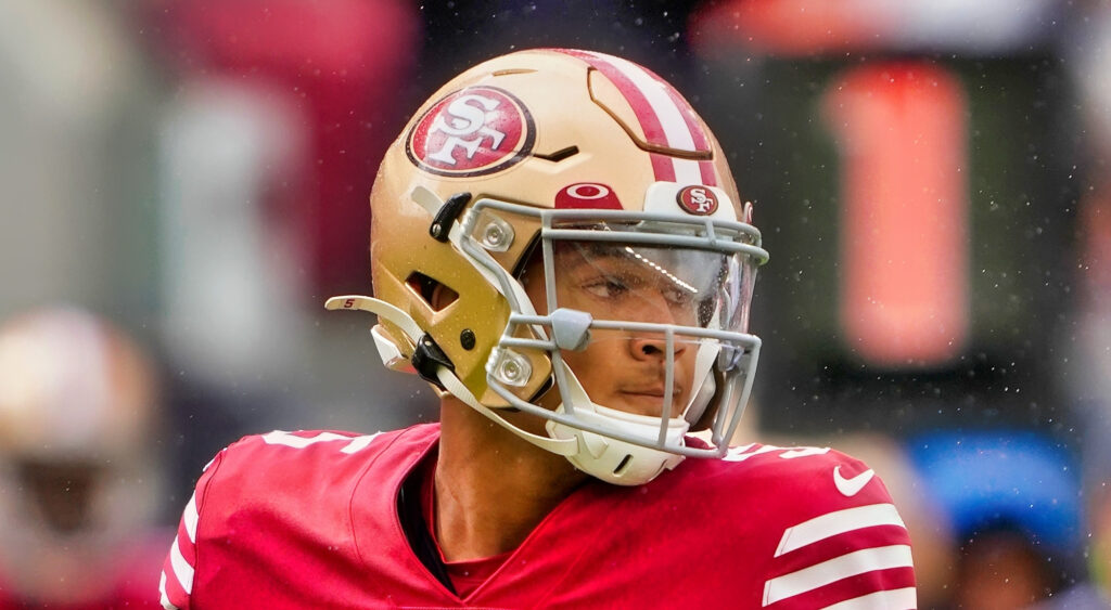 San Francisco 49ers quarterback Trey Lance looking to throw ball in 2022 game.