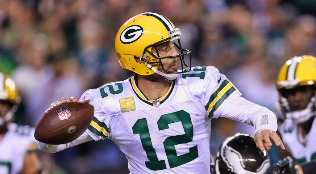 Aaron Rodgers throwing a football
