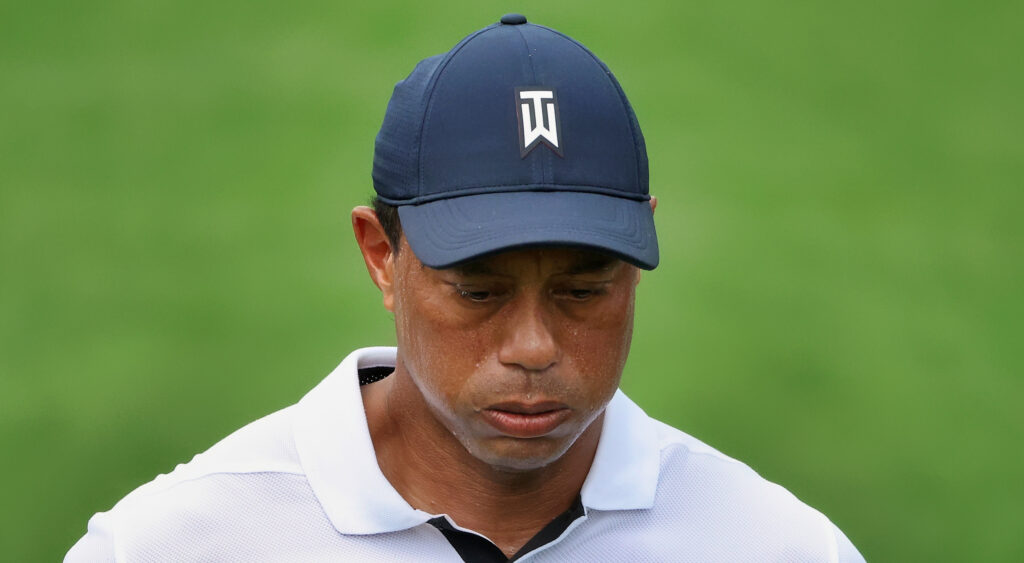 Tiger Woods sweating and looking distraught