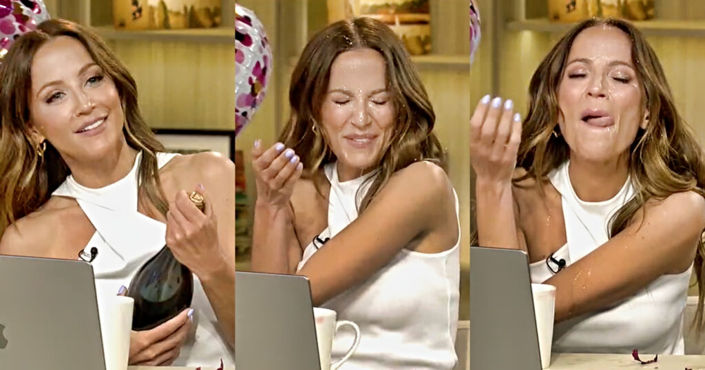 Kay adams with champagne on face