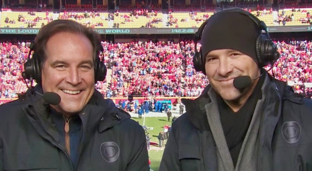 Tony Romo and Jim nantz smiling while on broadcast