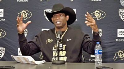 Deion Sanders with Cowboy hat on