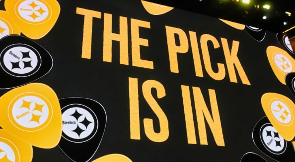 "The pick is in" appears on the video board at the NFL Draft for the Steelers' pick.