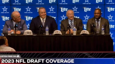 Jerry jones, Mike McCarthy and higher ups at podium