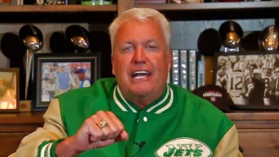 Rex Ryan with Jets gear on