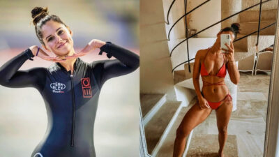 Alexandra Ianculescu posing in swimsuit and olympics gear