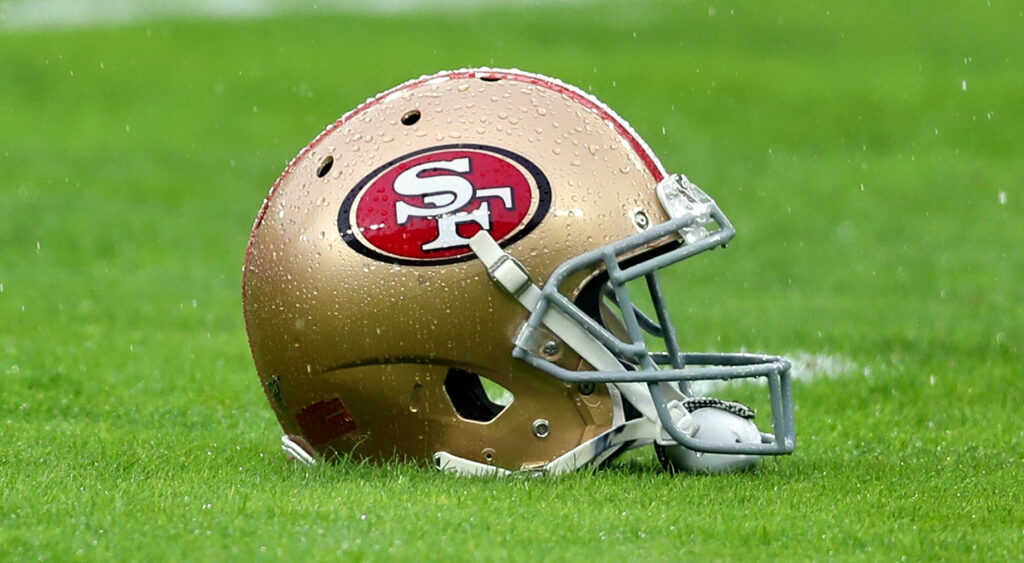 49ers helmet on field.